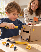 Child building a cardboard mailbox with the bolt driver while a parent watches